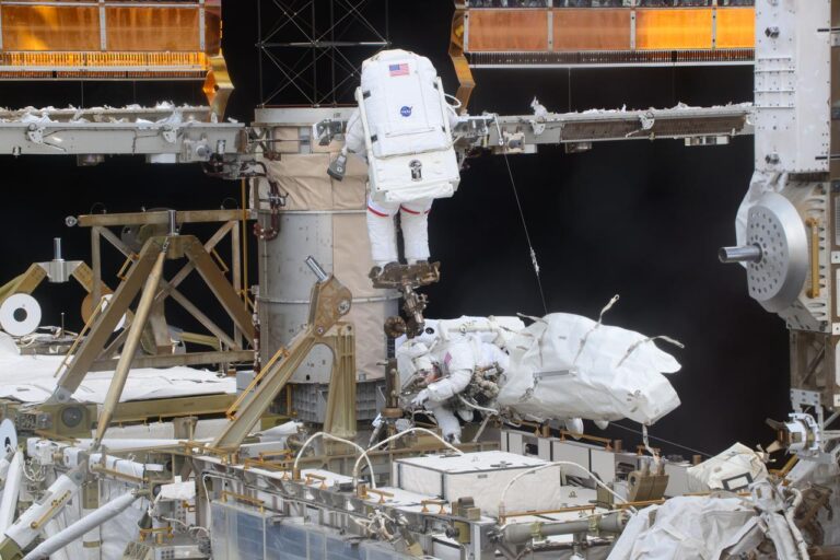 NASA interns working lab student