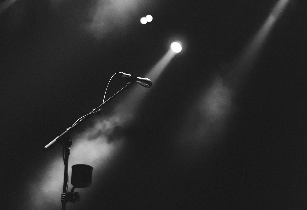 microphone stage storytelling spotlight